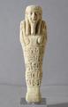 Ancient Egyptian faience shabti <br/> with hieroglyphic inscriptions by  